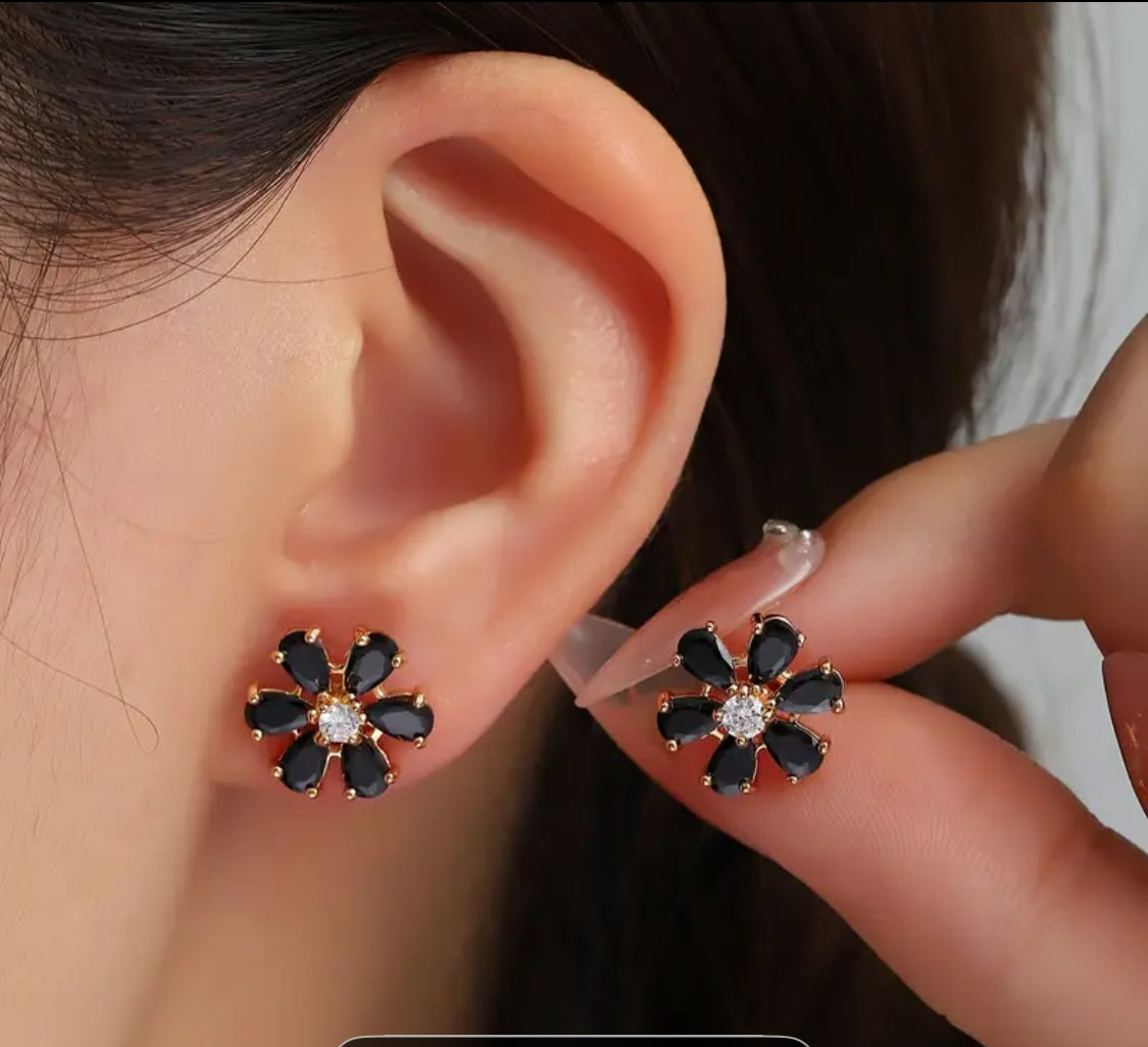 BROQUELES FLOR NEGRO