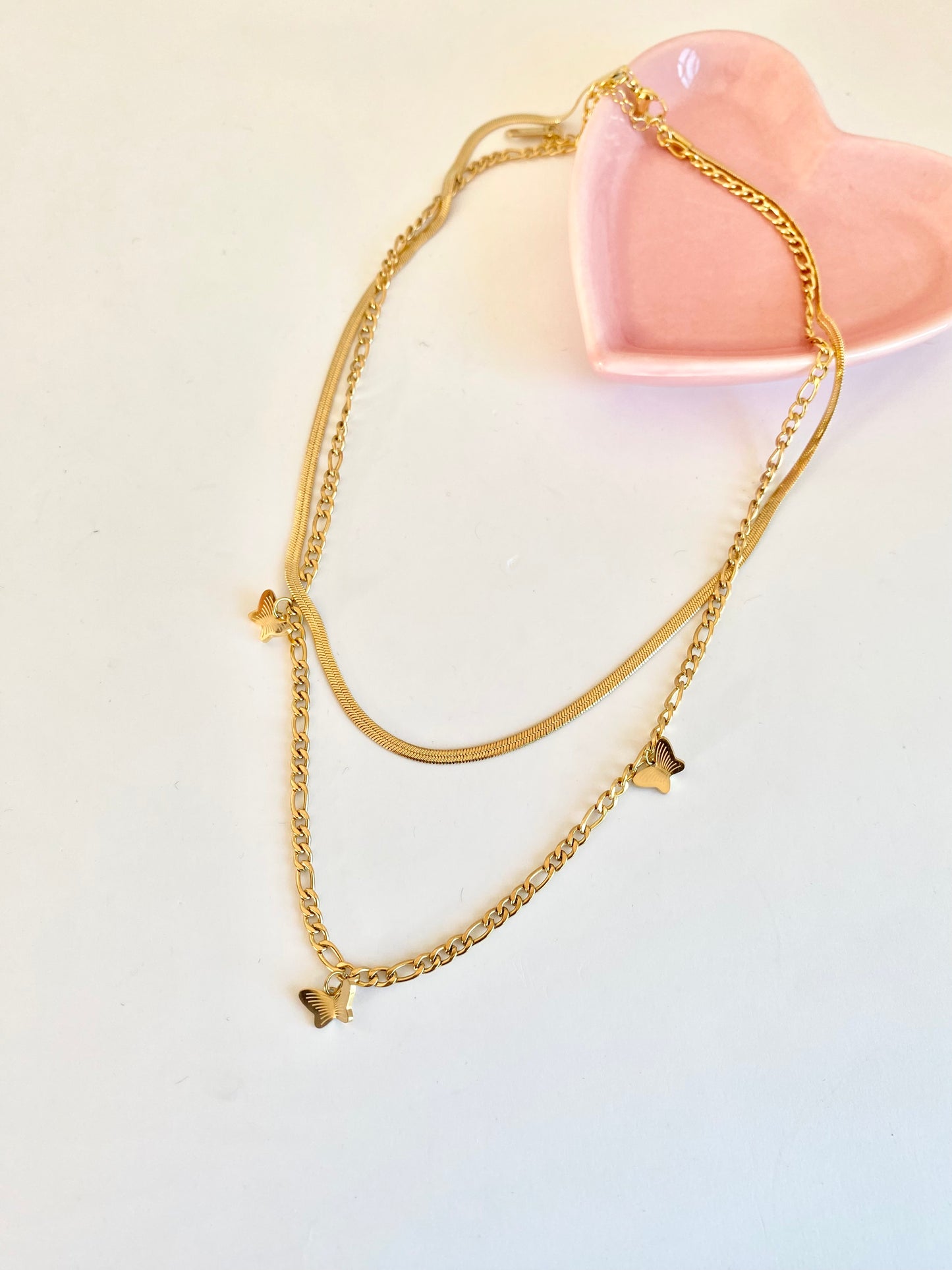 COLLAR DOBLE CON MARIPOSAS AC INOX