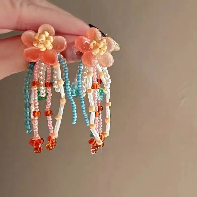 ARETES FLOR CHAQUIRA