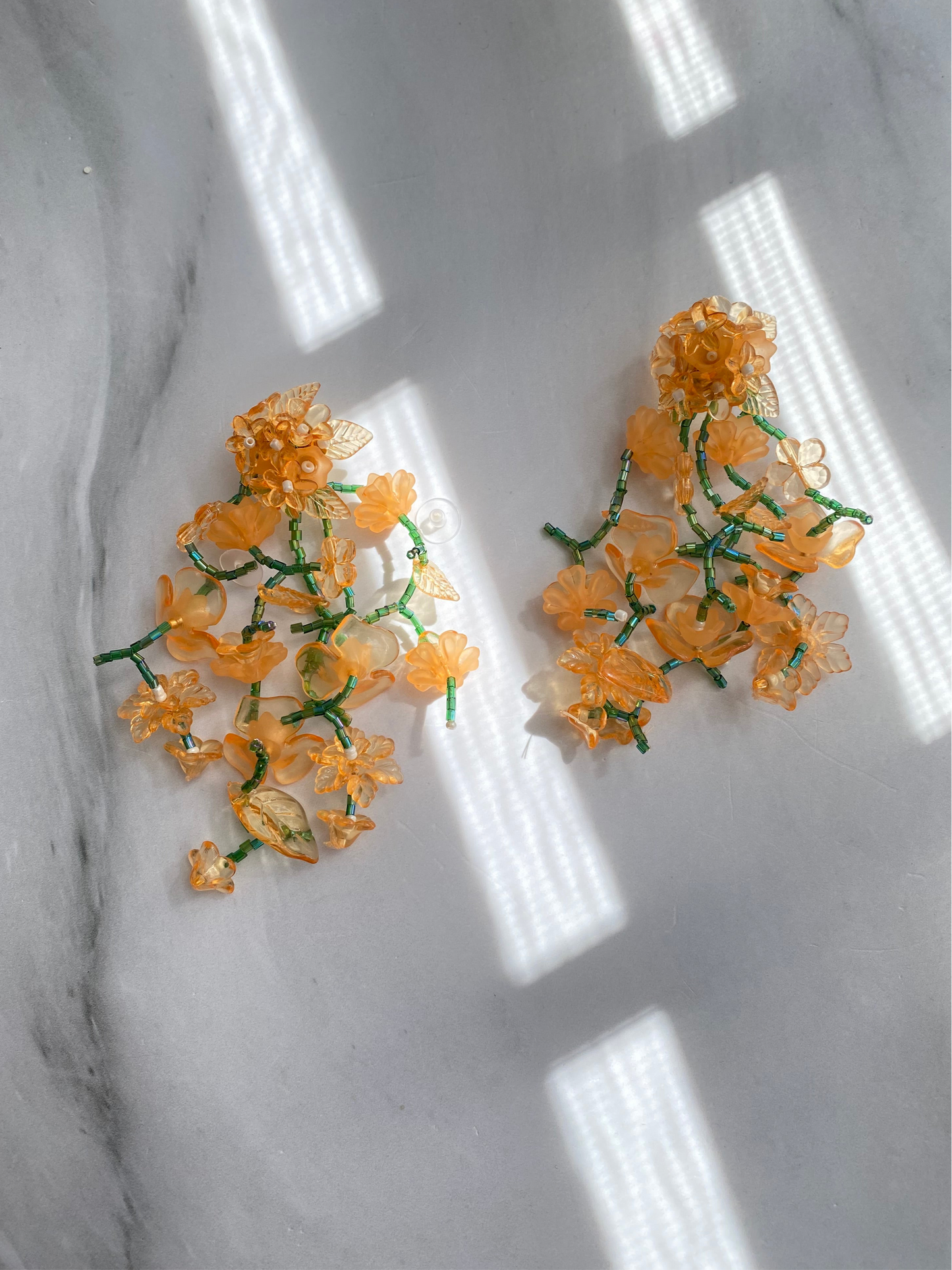 ARETES LARGOS FLORES