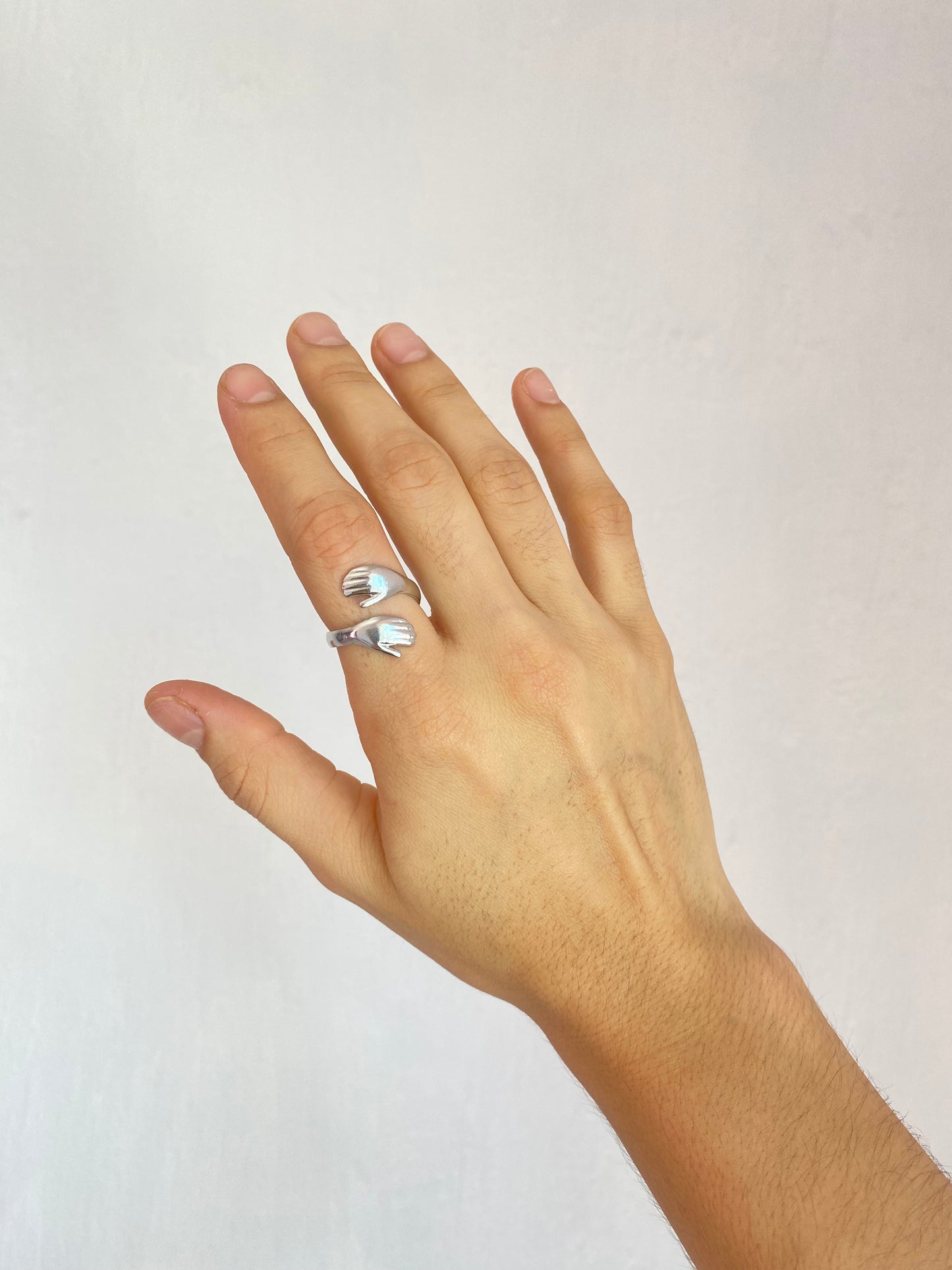 ANILLO MANOS PLATA AC INOX