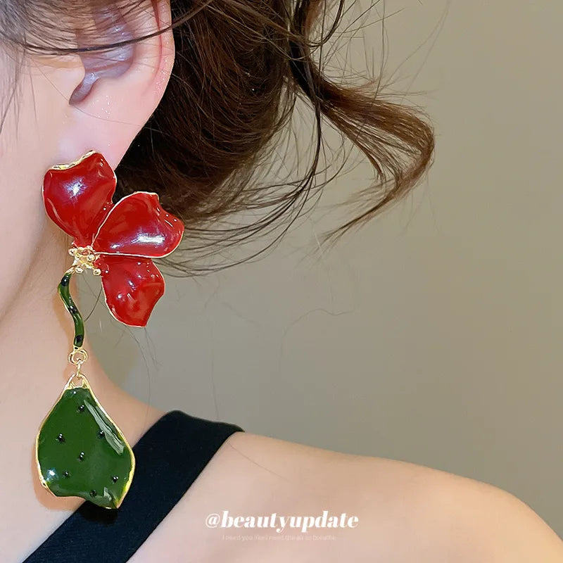 ARETES FLOR LARGOS