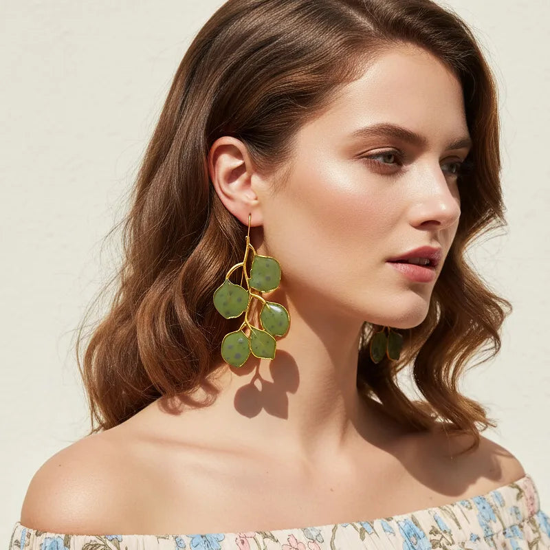 ARETES LARGOS HOJAS