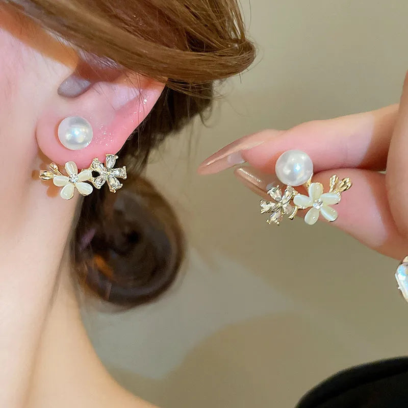 ARETES DE FLORES CON PERLA