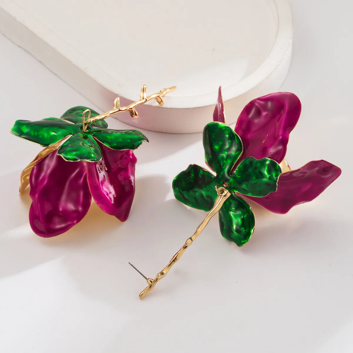 ARETES LARGOS FLOR