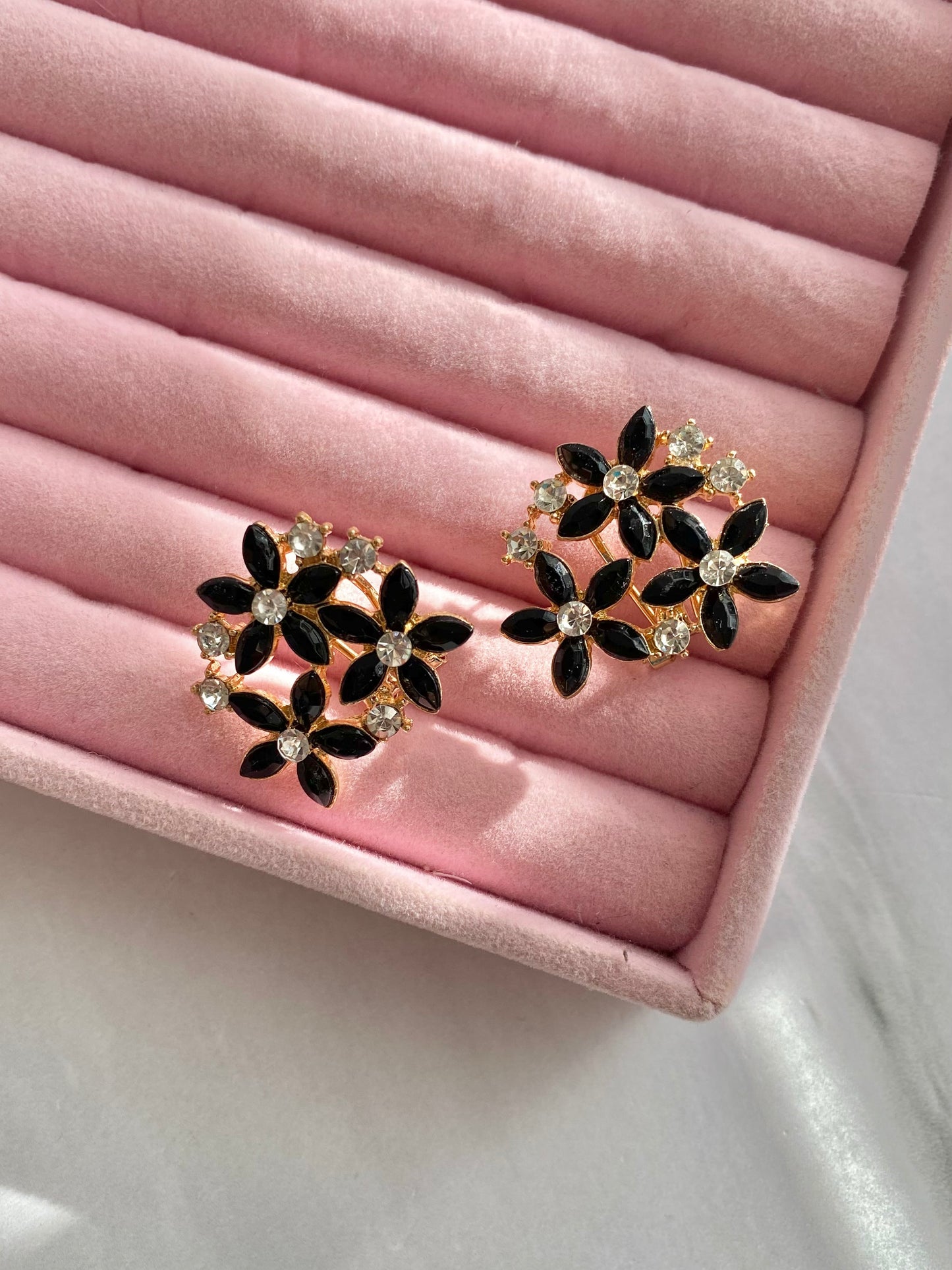 BROQUELES FLOR NEGRO