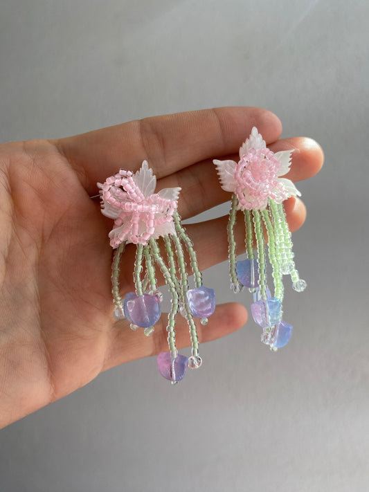 ARETES FLOR LARGOS DE CUENTAS