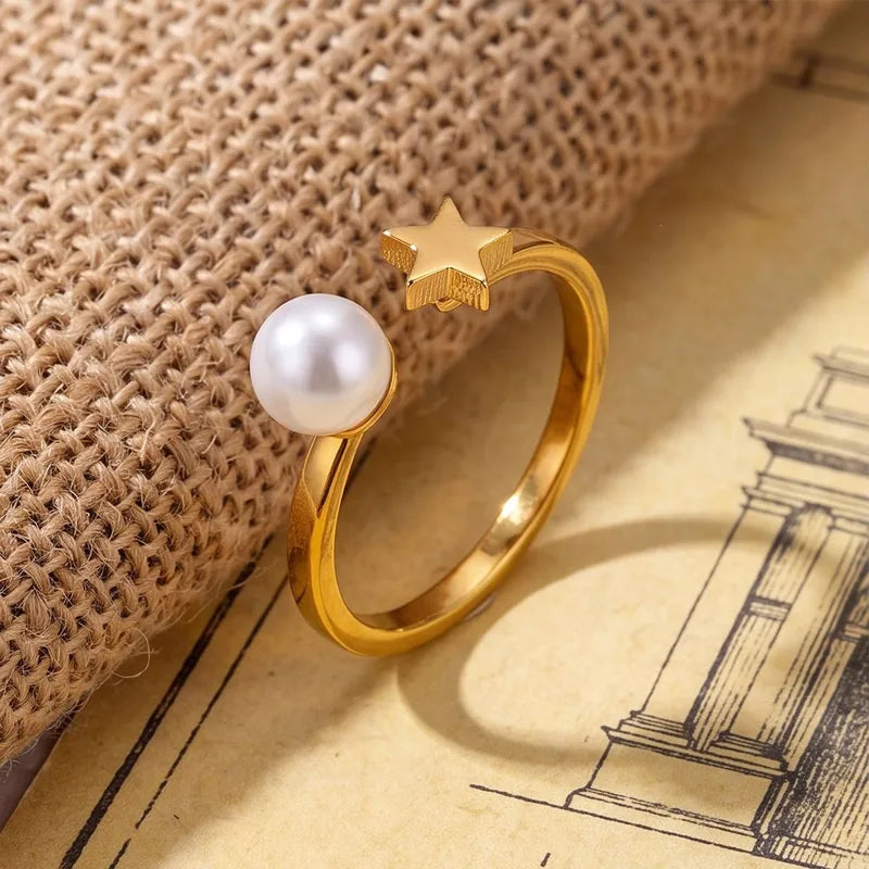 ANILLO PERLA Y ESTRELLA AC INOS