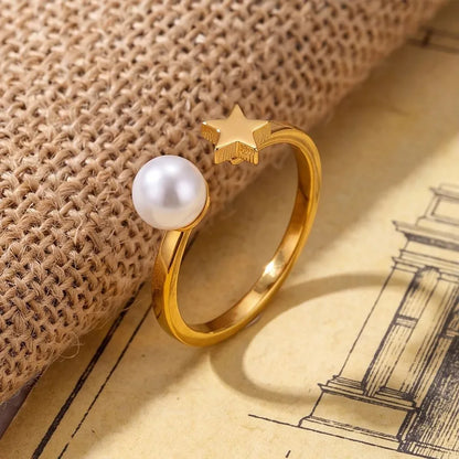 ANILLO PERLA Y ESTRELLA AC INOS