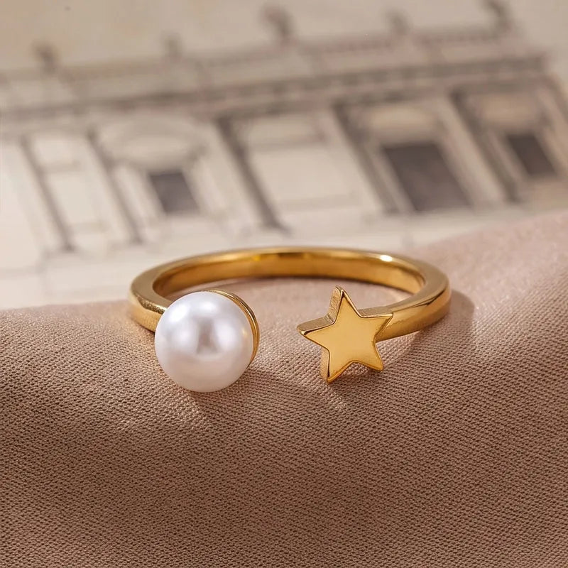 ANILLO PERLA Y ESTRELLA AC INOS