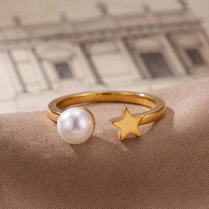 ANILLO PERLA Y ESTRELLA AC INOS