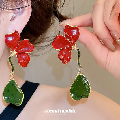 ARETES FLOR LARGOS