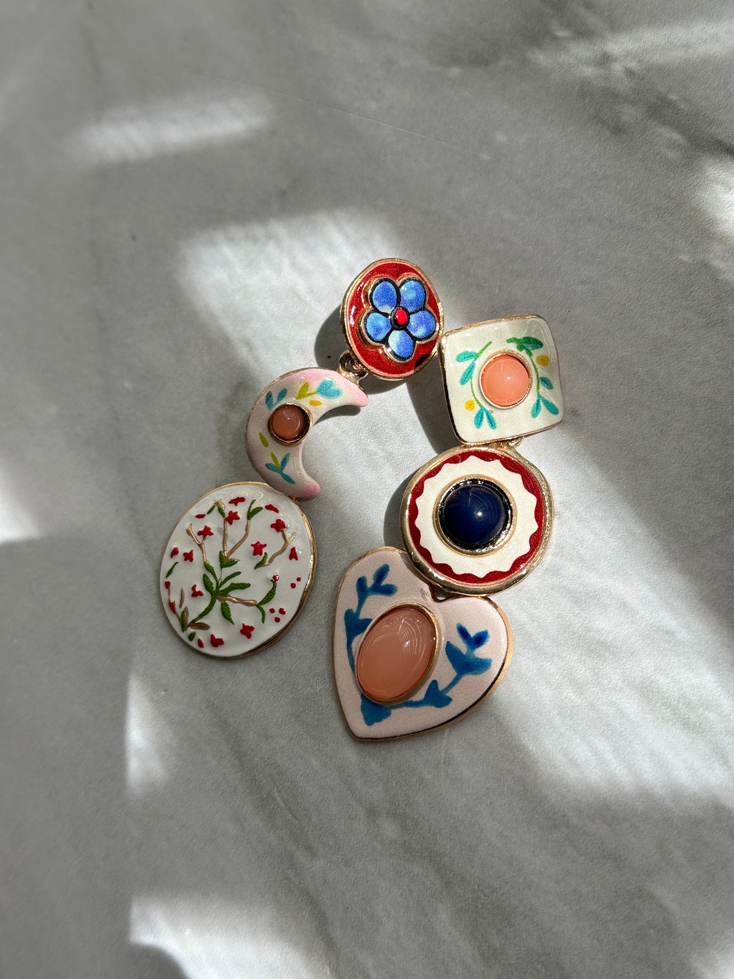 ARETES LARFOS ASIMÉTRICOS