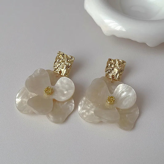 ARETES LARGOS DE FLOR