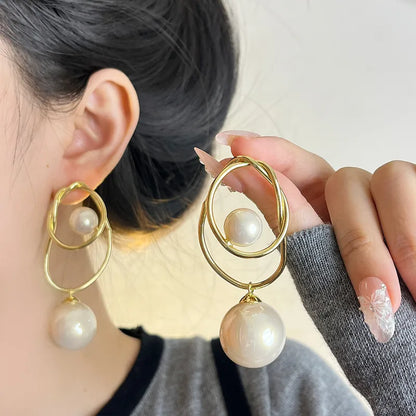 ARETES BRISA IRREGULARES CON PERLA