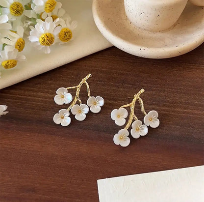 BROQUELES ESTILO FLORAL