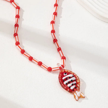 COLLAR PEZ VIDRIO