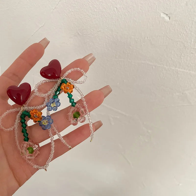 ARETES DE CORAZON CON LAZO