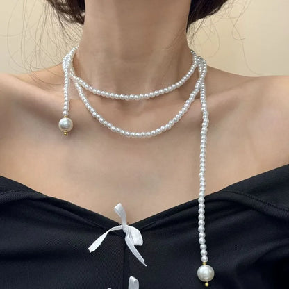 COLLAR EXTRA LARGO CUENTAS BLANCAS